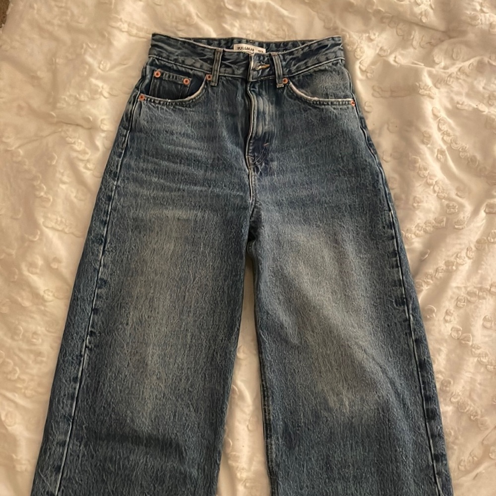 Pull and bear size 0 wide legged jeans.